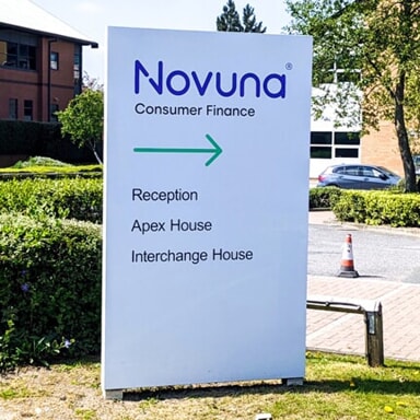 An image of outdoor wayfinding signage for Novuna.